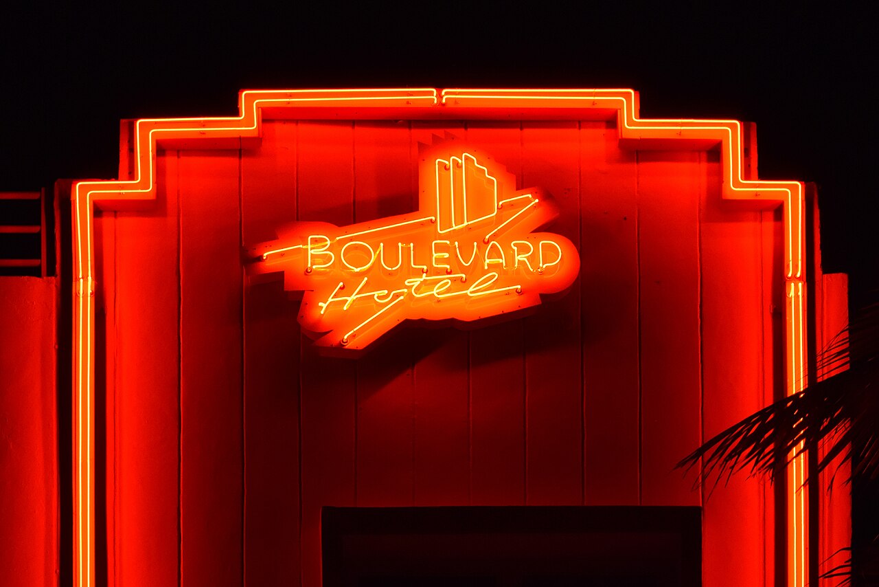 Neon sign of the Boulevard Hotel on Ocean Drive, Miami Beach Art Deco District, Florida. The building was designed by architect August Swarz, and completed in 1950. The photo was taken from east direc