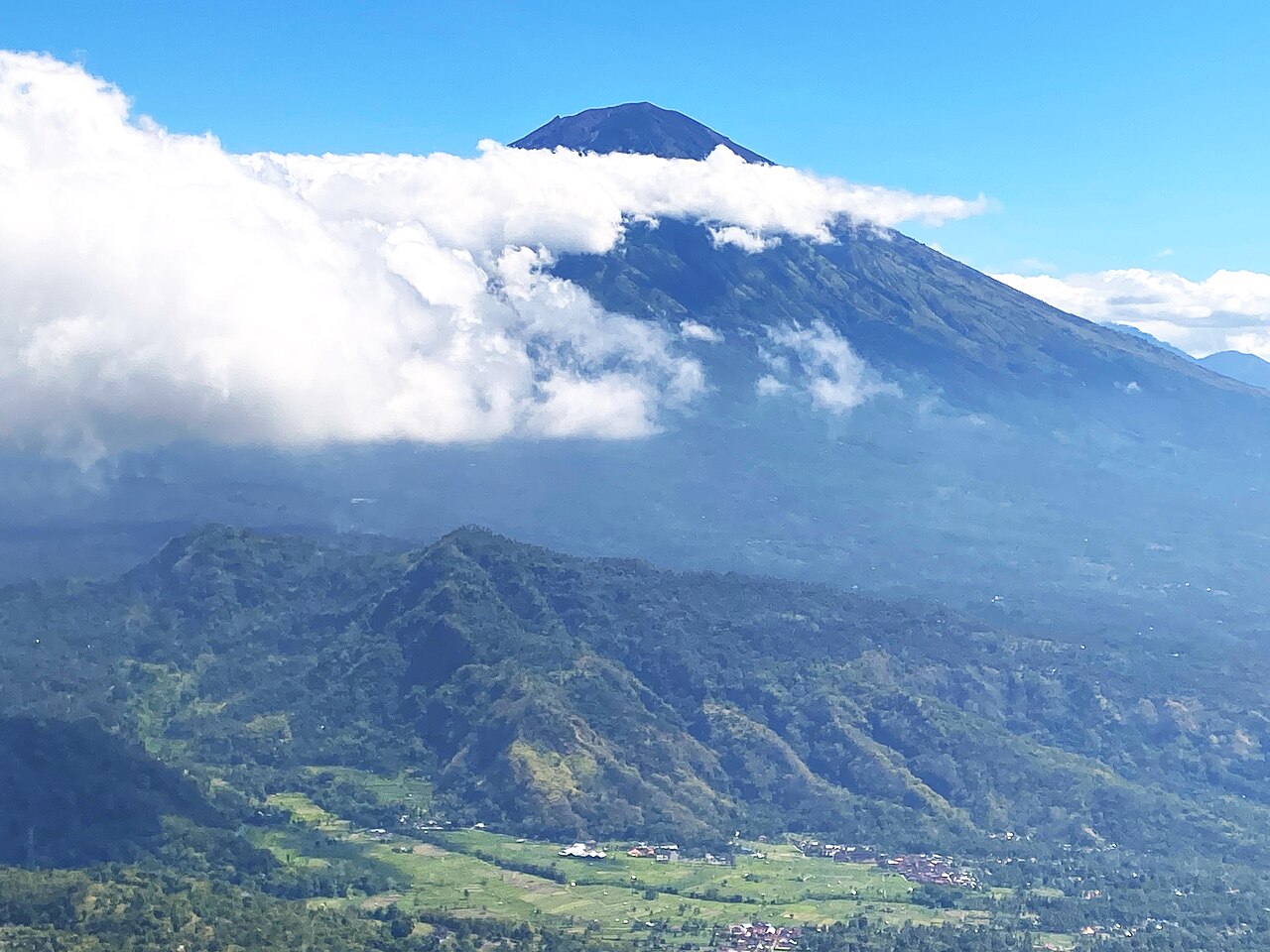 Mount Agung, Bali's highest mountain, seen across the valley from Lahangan Sweet, Gulinten Village, Abang, Karangasem Regency