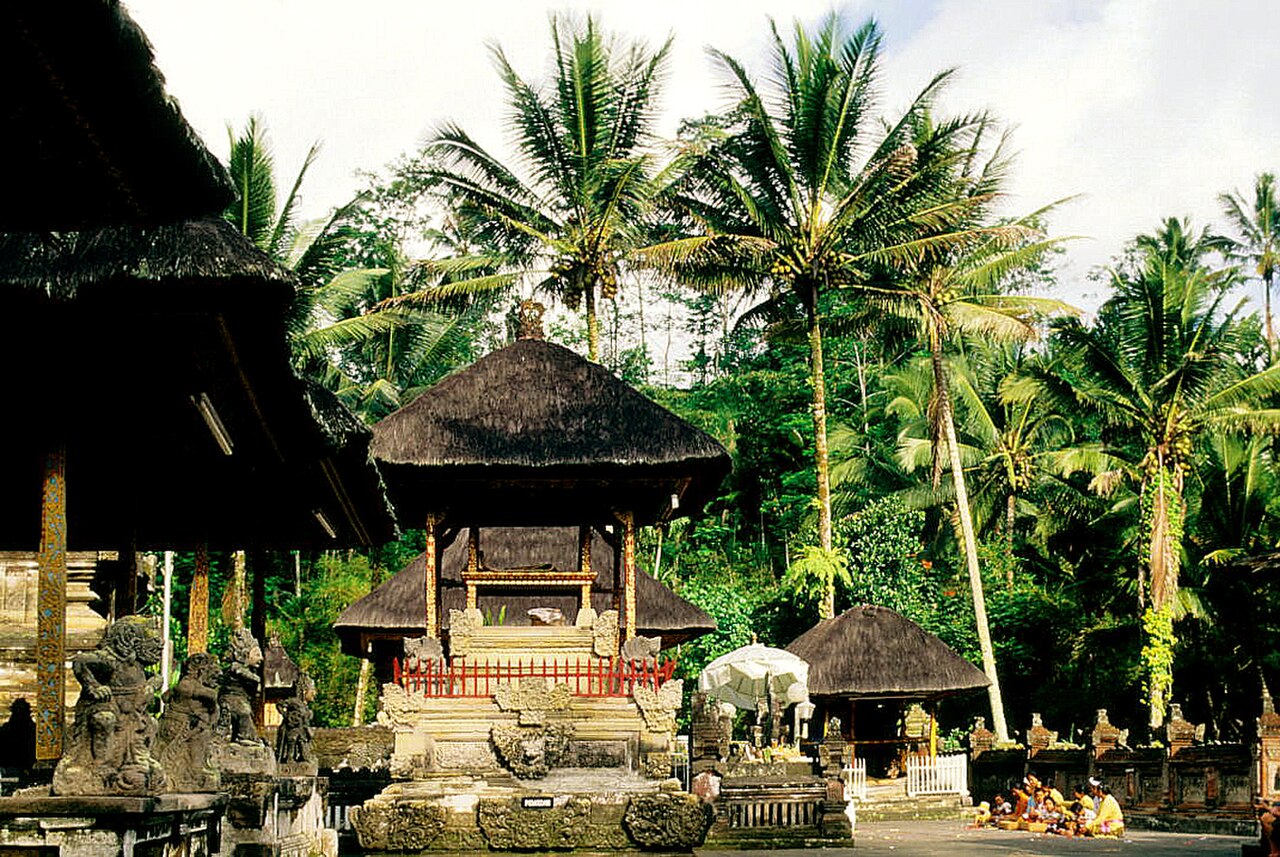 Tirta Empul Temple with faithful people praying. Tampaksiring, Gianyar, Bali, Indonesia