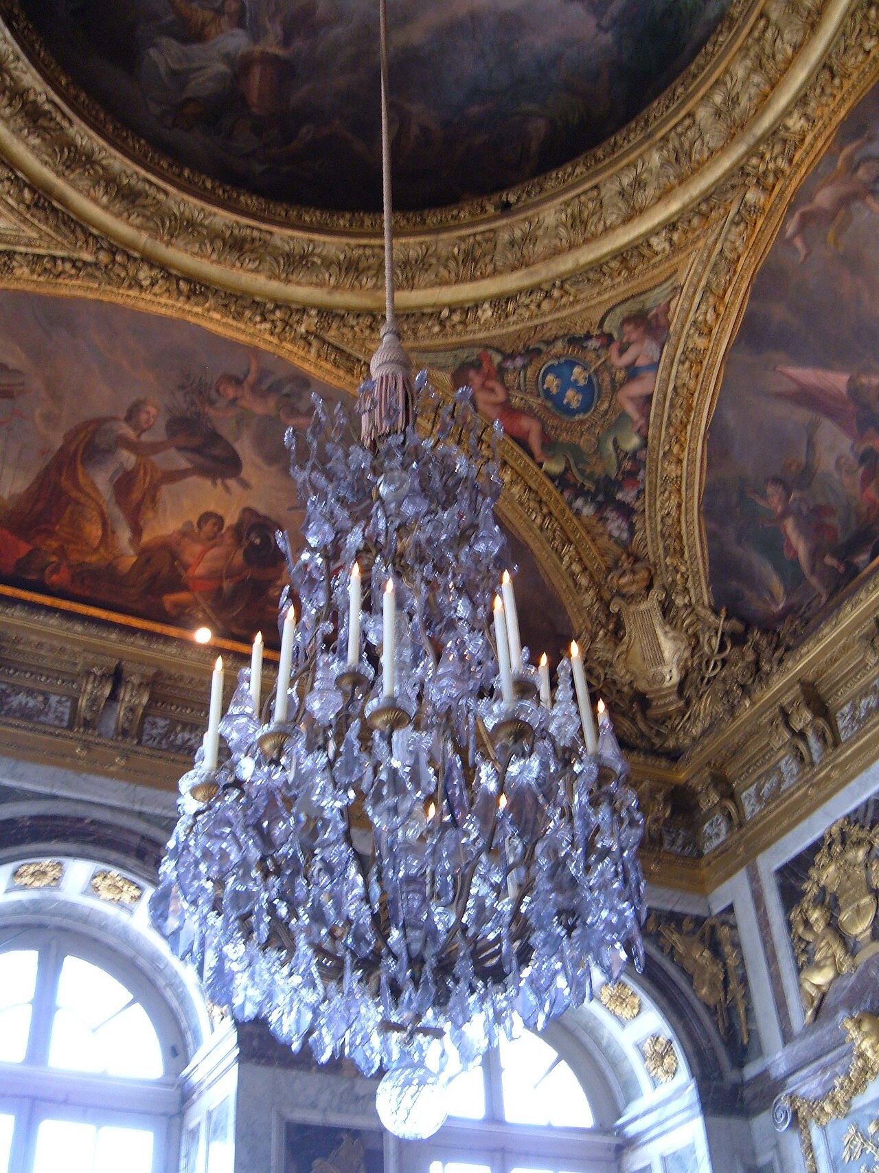A chandelier in the Hall of Mirrors in the Palace of Versailles in Versailles, Yvelines department, France.