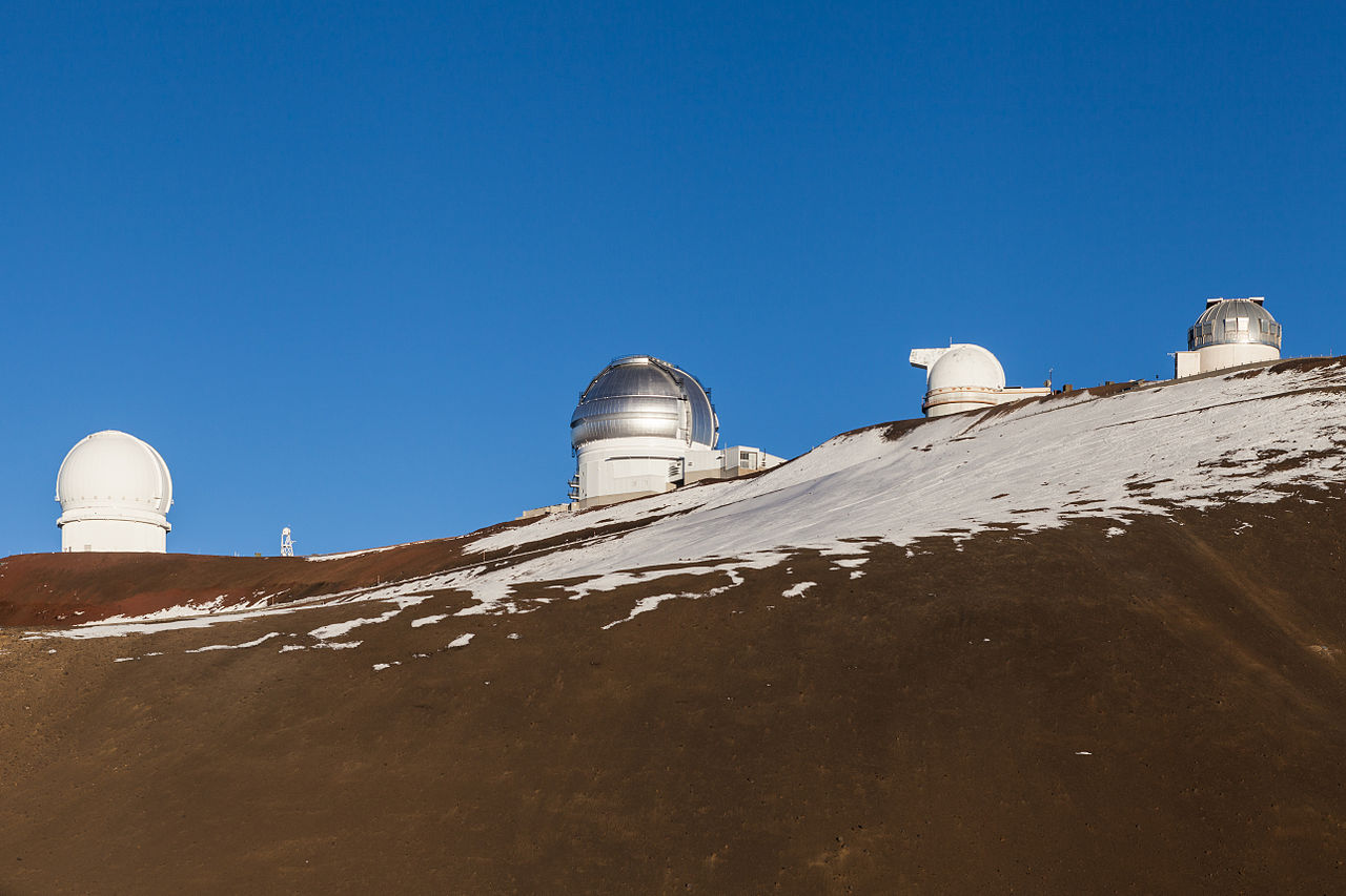 Telescopes near the summit of Mauna Kea, Hawaii.  Image taken near at 4070m (13,353 ft), looking east and up to 4200m (13,780ft).  From left to right, the Canada-France-Hawaii, Gemini, UH 2.2m, and UK
