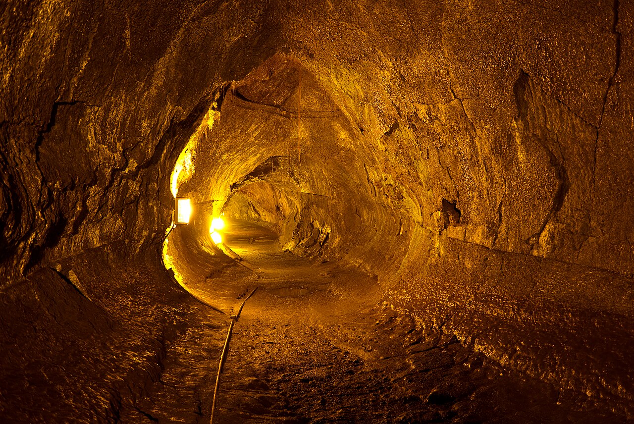 Thurston Lava Tube at Hawaii Volcanoes National Park, Big Island, Hawaii. The step mark on the right wall indicates the depth at which the lava flowed for a period of time.