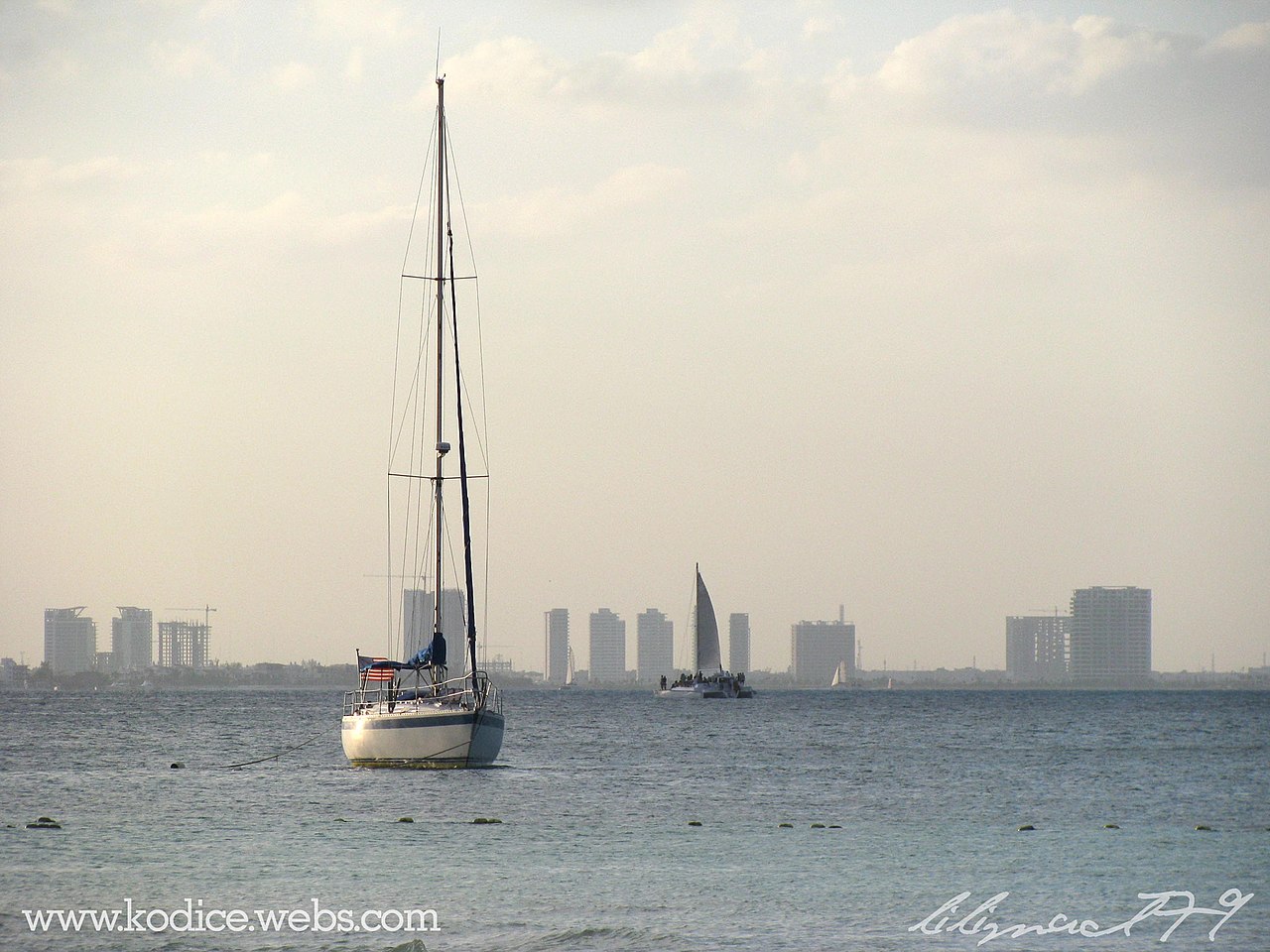 500px provided description: Cancun [##Cancun #Ship #Beach #Sea]