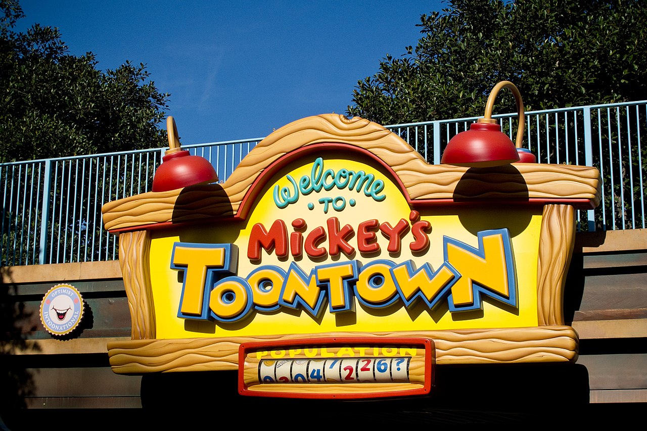 A sign above the entrance for Mickey's Toontown in Disneyland.