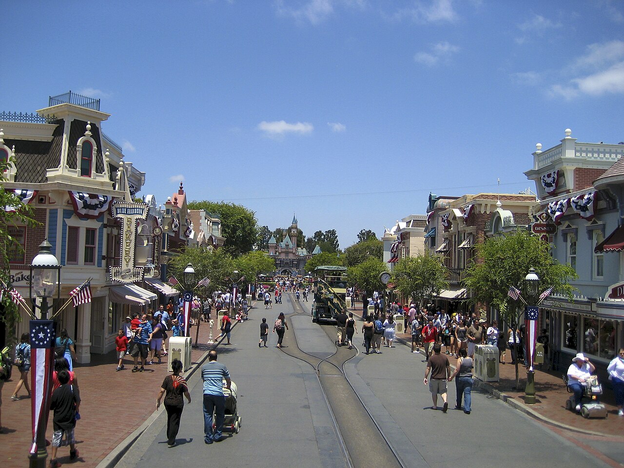Disneyland's Main Street, U.S.A. with July 4th decorations.