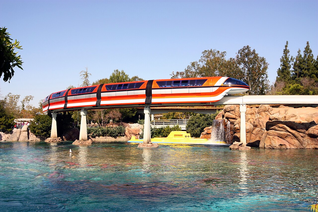 Monorail Orange passing over the submarine Argonaut at Disneyland Park.