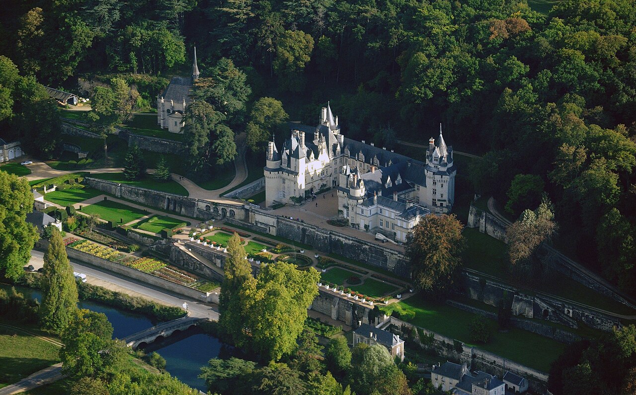 Aerial view of Ussé castle by the Indre river at the commune of Rigny-Ussé (Indre-et-Loire department, France). The church of Our Lady, to the left of the castle, belongs to the domain. Nikon D60 f=90