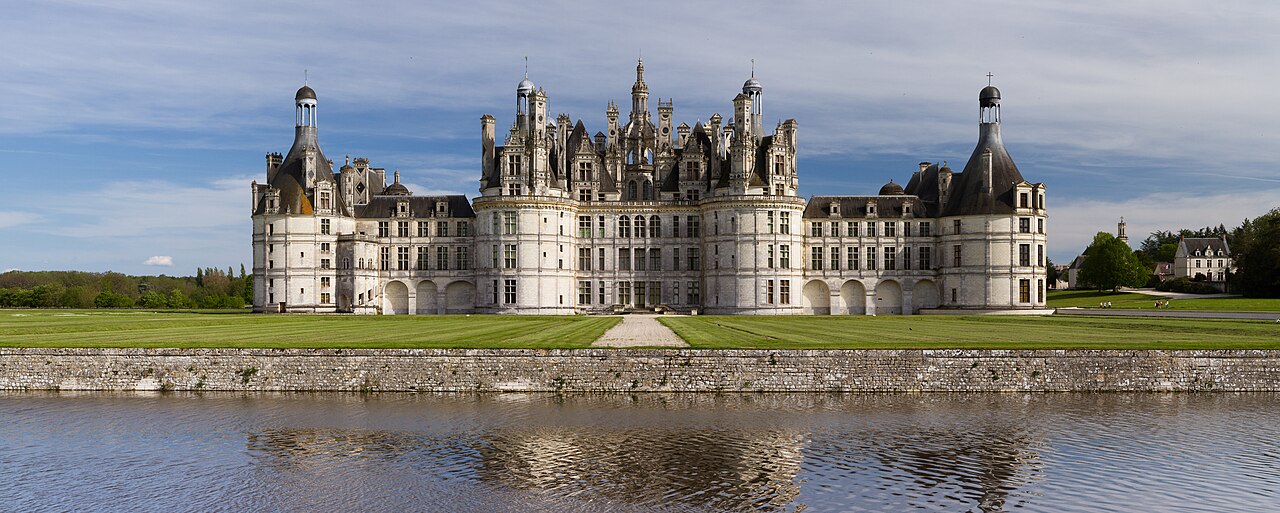 Northwest façade of Chambord castle. Built between 1519 and 1547 by François I, it was heavily extended afterwards by Henri II and Louis XIV to its final shape we know well today. Chambord castle is a