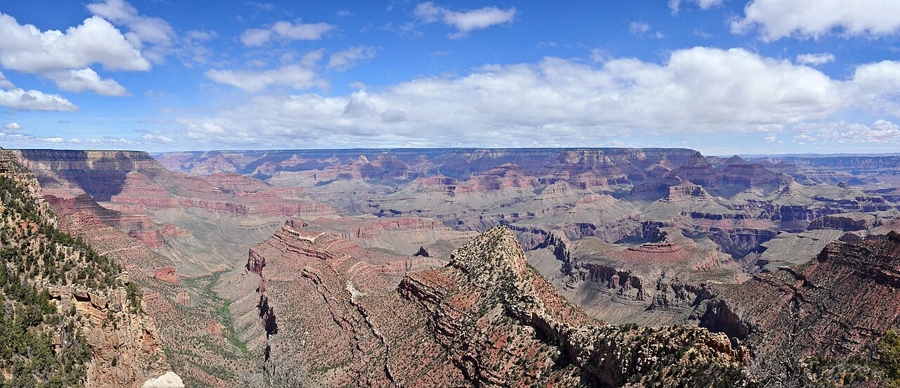 (8000 x 3449) Elevation: 7399 feet / 2256 meters. This popular South Rim viewpoint, between Grand Canyon Village and Desert View, offers panoramic views of Grand Canyon from east to west, including se