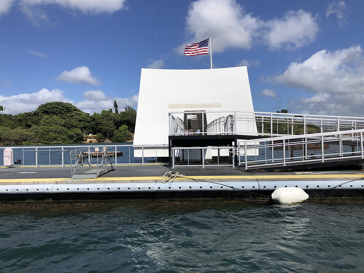 View of the USS Arizona Memorial from a USS Arizona Memorial ferry boat on approach in Pearl Harbor, Oahu, Hawaii