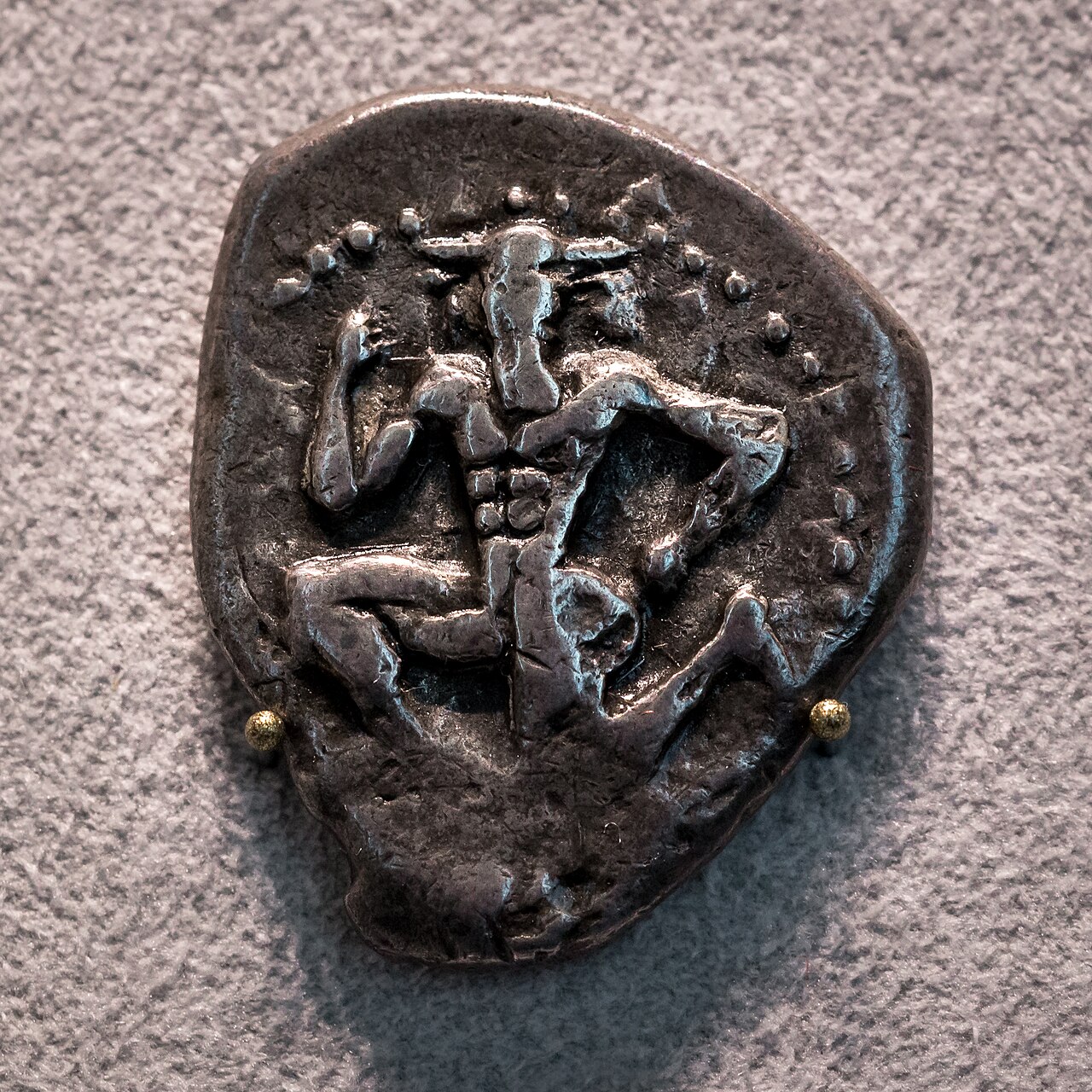 object type: Greek coin
- production technique: struck
- issuing authority: city: Knosos - ΚΝΩΣΟΣ
- period / date: ca. 425-360 BC
- material: silver
- denomination: stater
- diameter: 23-27 mm
- weigh