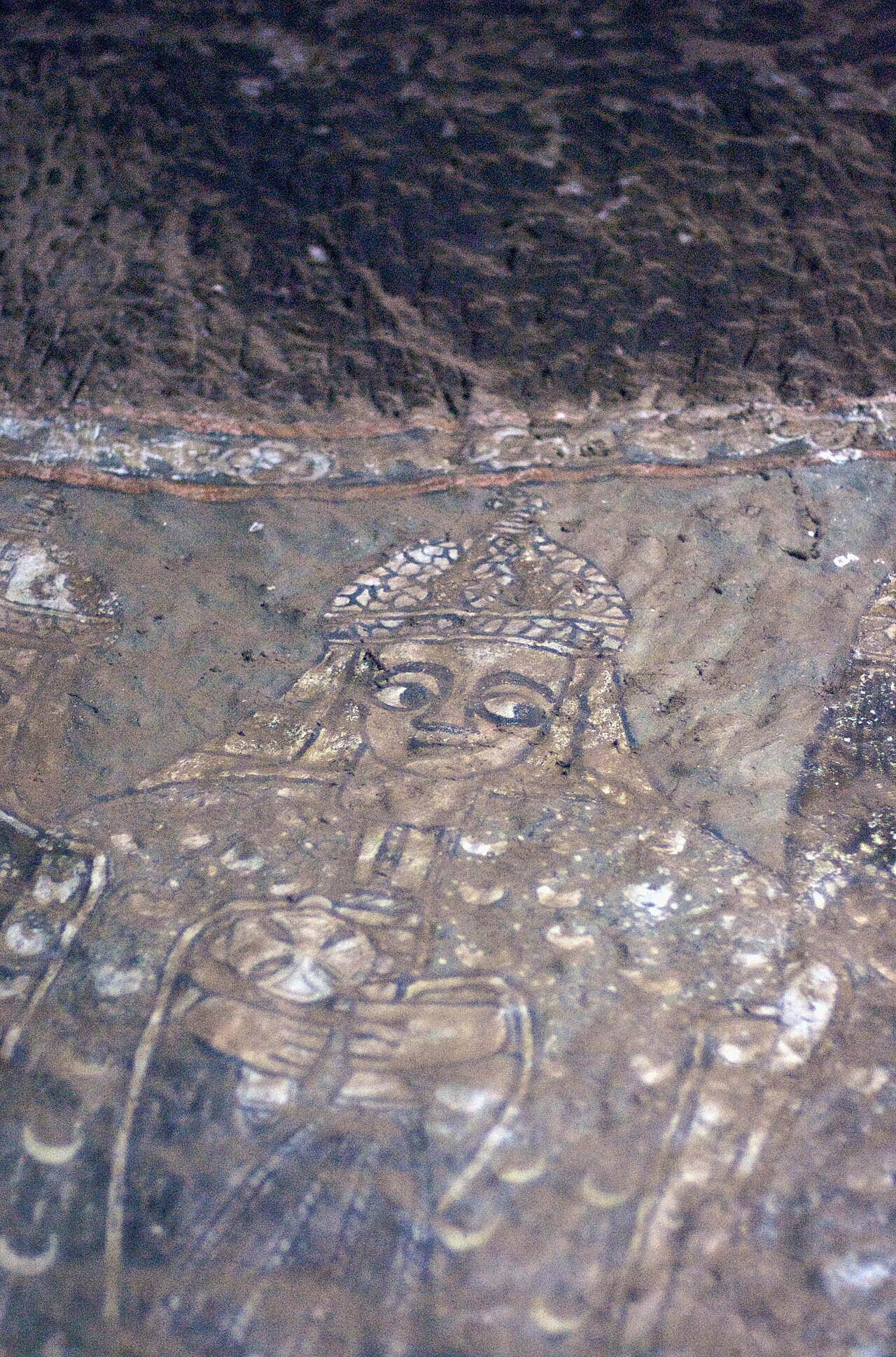 According to the Bradt Guide Ethiopia by Phillip Briggs (4th ed., November 2005),
"Bet Mercurios is a cave church.  It was orginally used for secular purposes, and may well be around 1,400 years old. 