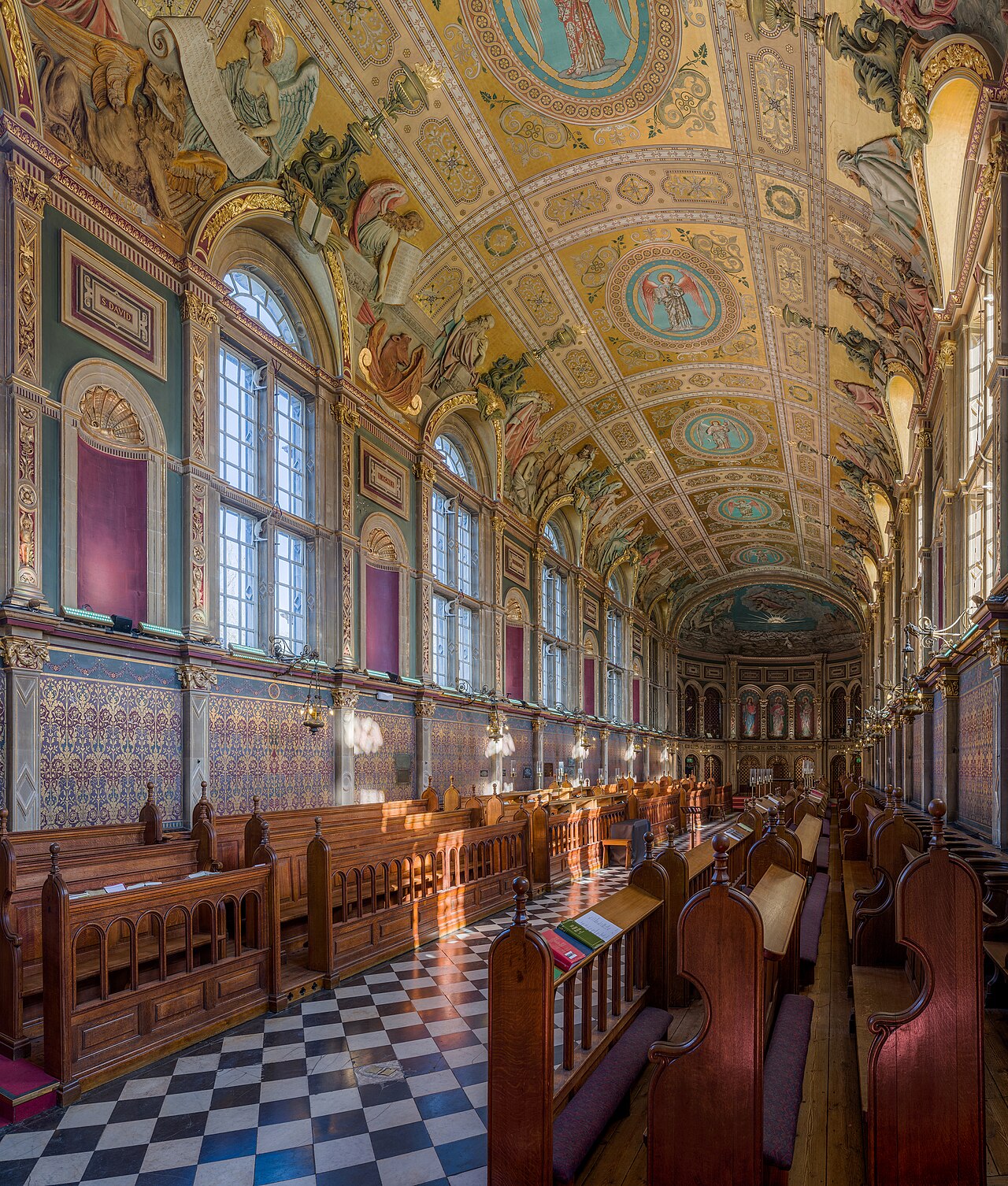The interior of the chapel looking north-east at Royal Holloway, University of London, Surrey, England.