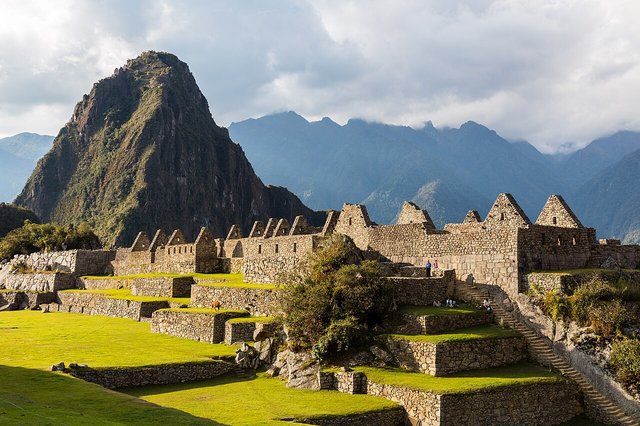 View of the ancient houses of Machu Picchu houses, Urubamba Province, Cusco Region, today Peru. The 15th-century Inca citadel, abandoned one century later, is situated in the Sacred Valley on a mounta