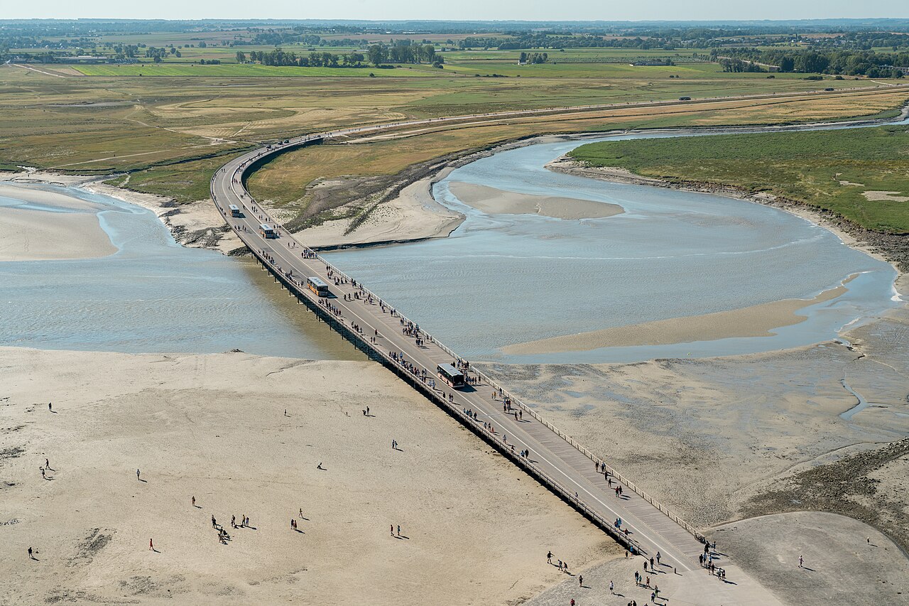 Bridge leading to Mont-Saint-Michel. Special two-way buses run regularly between the bridge and the parking lot.