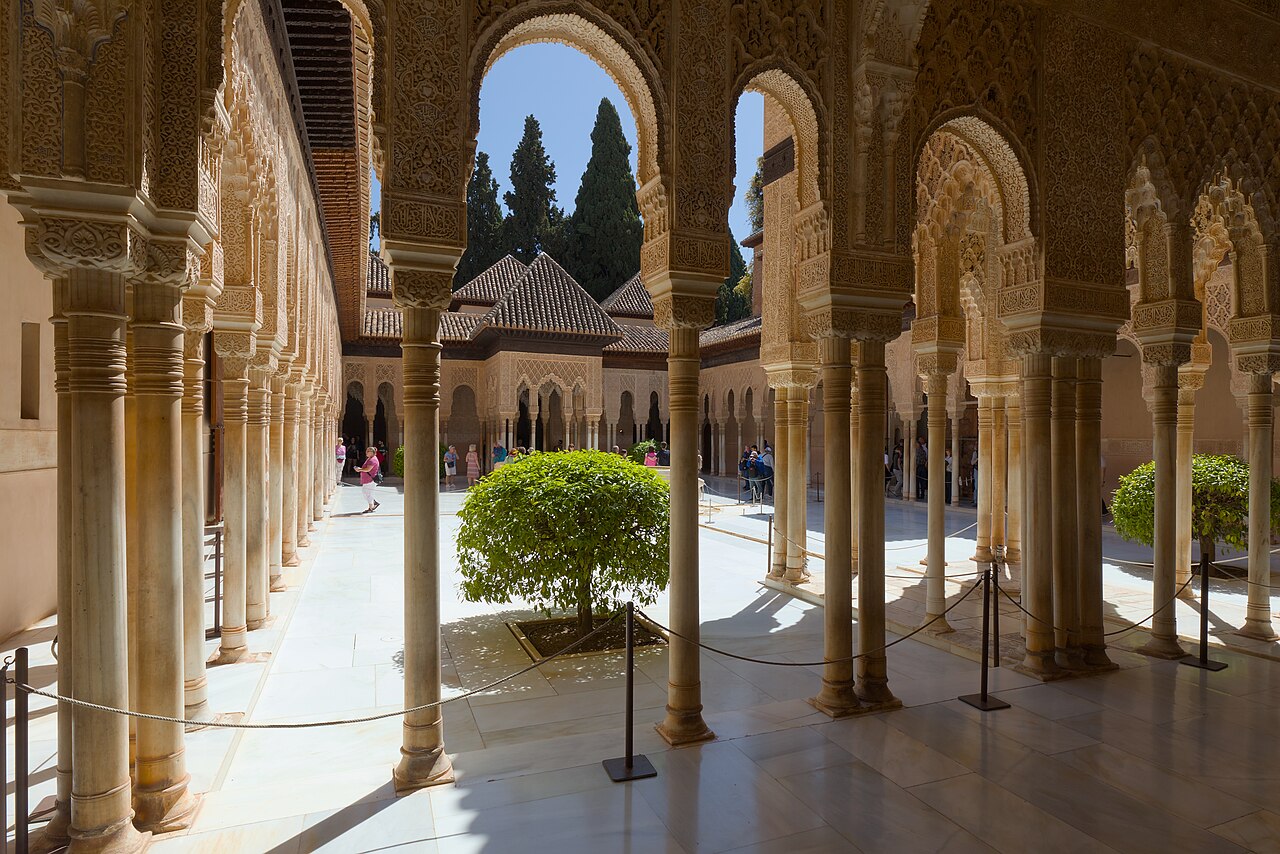 Granada (Andalusia, Spain) - Alhambra - Palacios nazaríes - Palacio de los Leones - View of patio de los Leones through columns