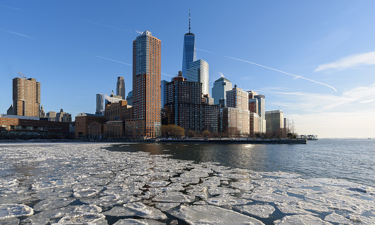 Battery Park City skyline over a frozen Hudson River, New York City.