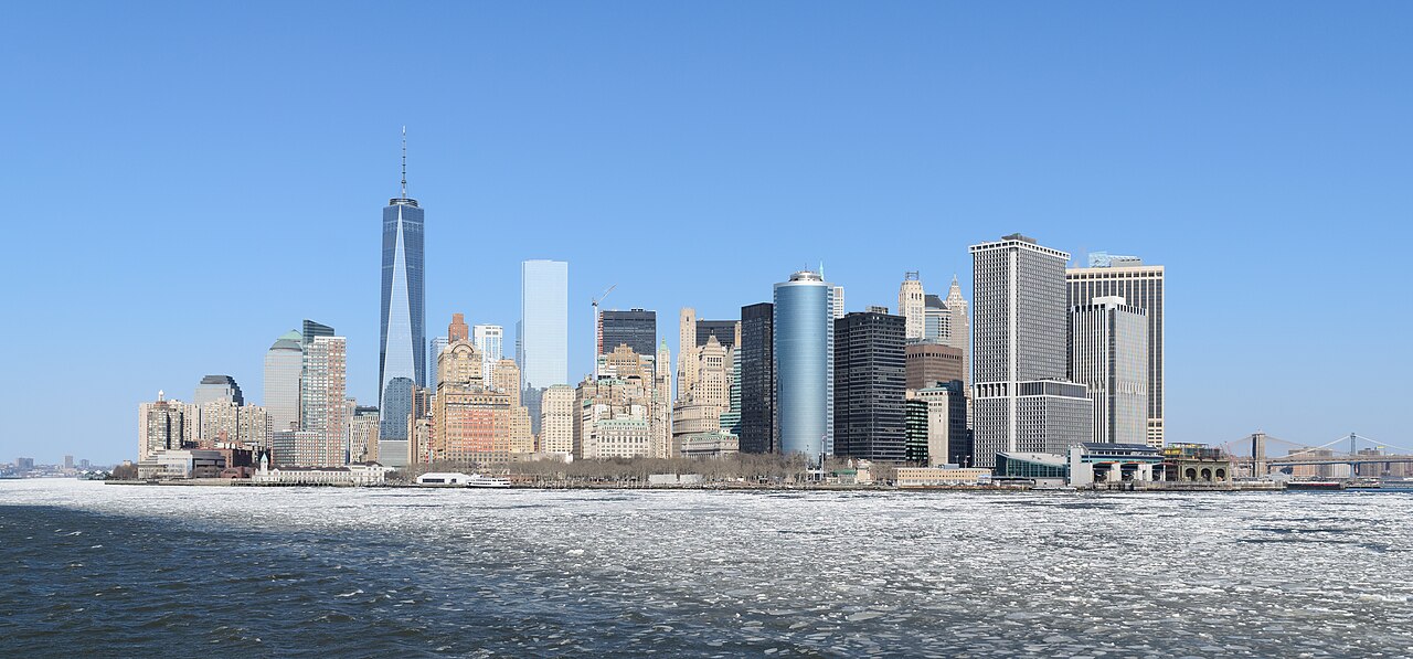 Lower Manhattan skyline, viewed from the Staten Island Ferry across a frozen Hudson River, New York City.