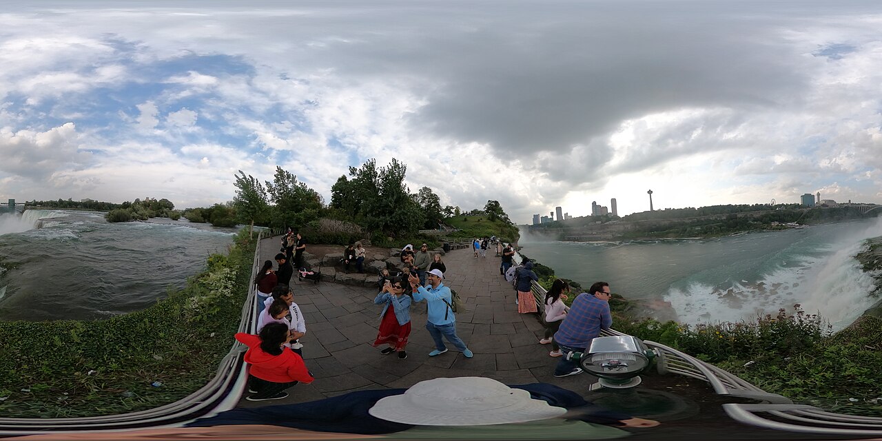 A 360 degree photo of the top of American Falls and Luna Island. Canada and the Skylon Tower is across the river.  Niagara Falls state park, Niagara Falls, New York.