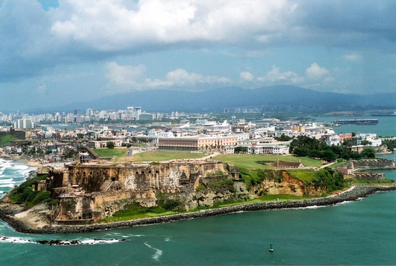 Aeriel view of Old San Juan with the Luquillo Mountain Range (Sierra de Luquillo) in the background.