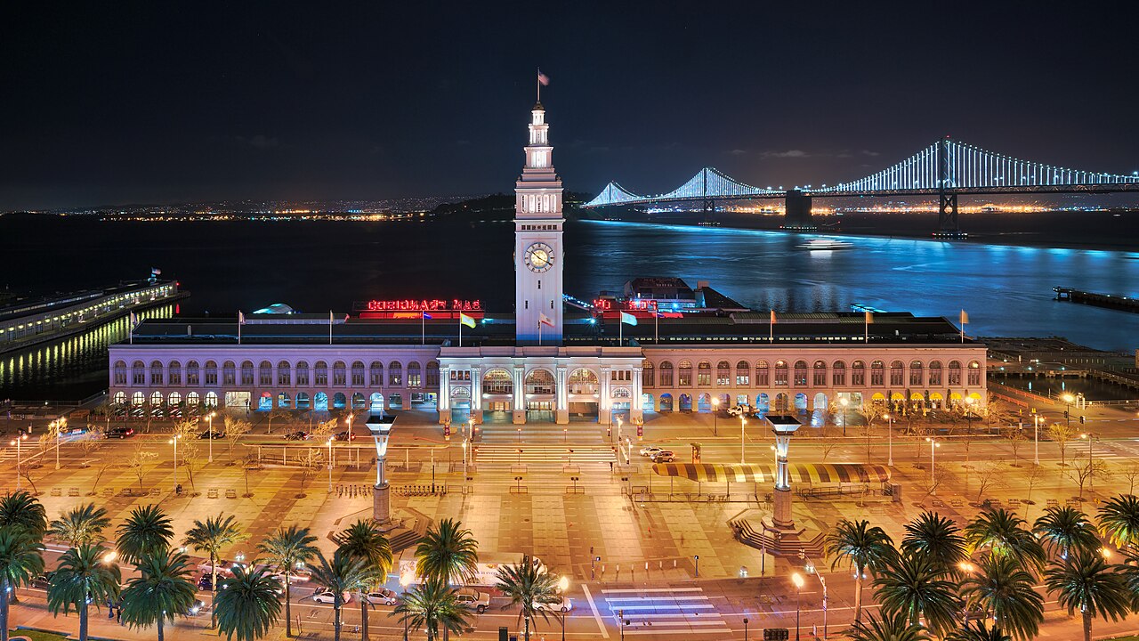 The Ferry Building is a terminal for ferries on the San Francisco Bay and an upscale shopping center located on The Embarcadero in San Francisco, California. The Bay Bridge can be seen in the backgrou
