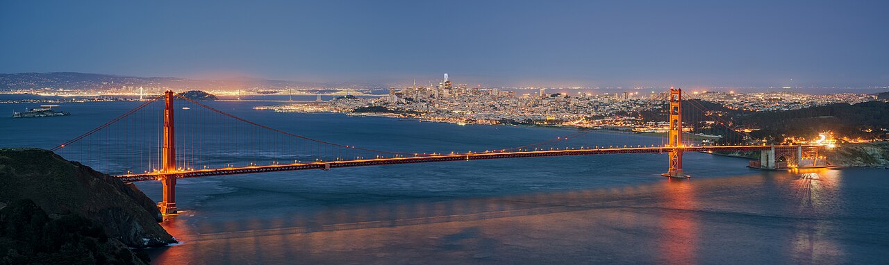 The Golden Gate Bridge and San Francisco as seen from Hawk Hill during blue hour.