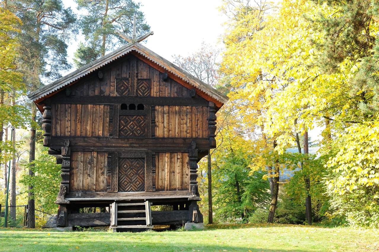Building and autumn foliage at Norsk Folkemuseum in Oslo Norway
