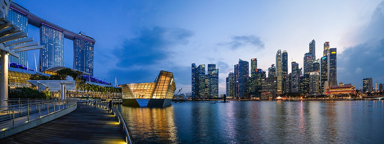 Singapore's Marina Bay at Dusk in 2018. From left to right, Marina Bay Sands (MBS), Louis Vuitton store and the CBD.