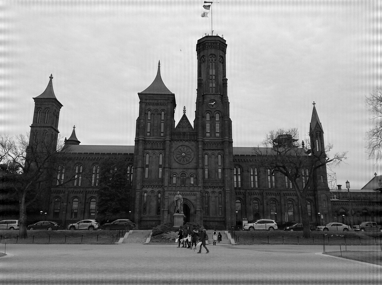 An image I took of the Smithsonian Institution Building while I was in Washington D.C. that I have injected with periodic noise, followed by notch filtering in the frequency domain.