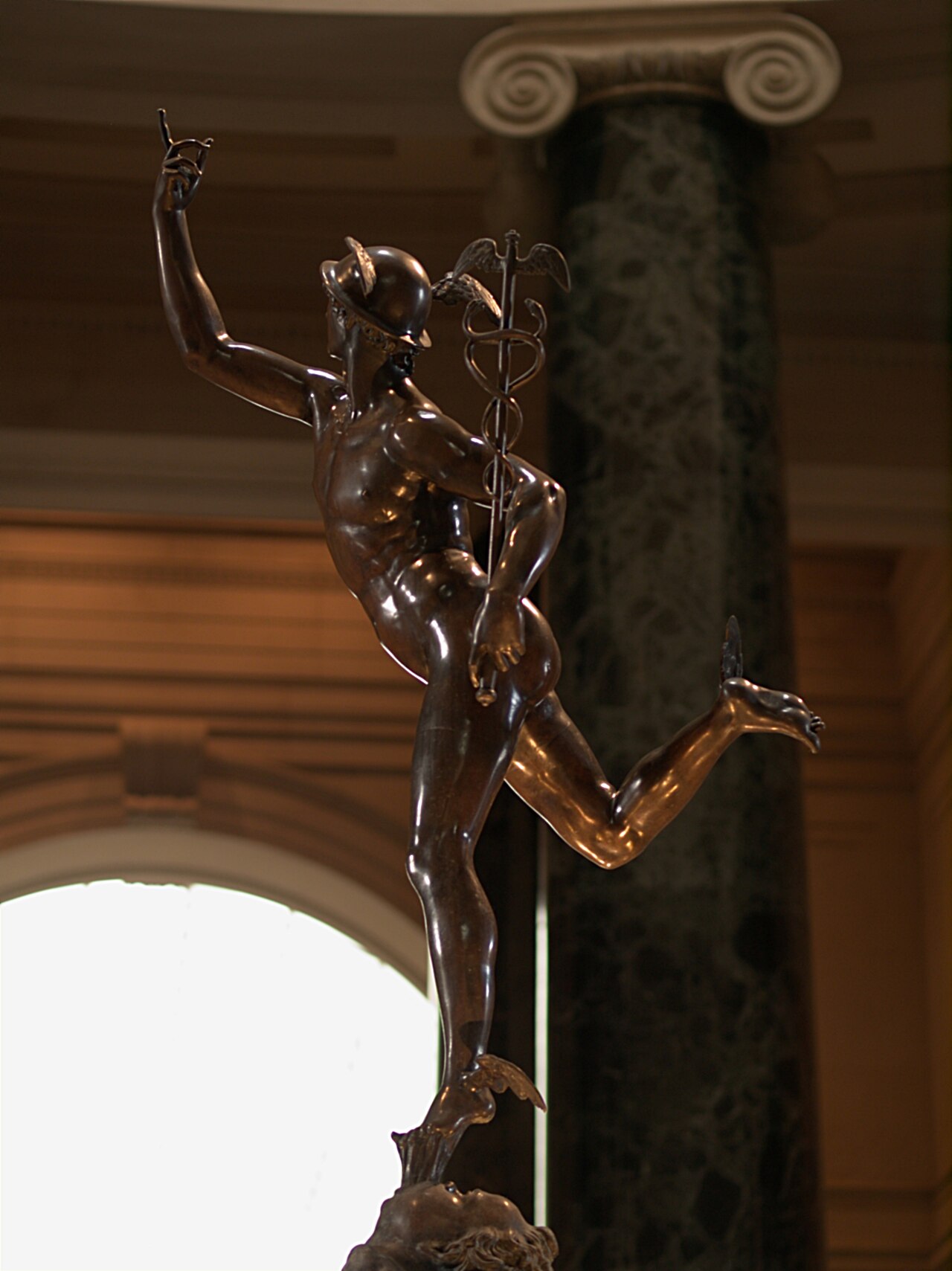 Mercury.
bronze.
I've always felt sorry for that putto he's standing on ...
See also:
<a href="https://www.flickr.com/photos/paulpablopawel/371409073/">flickr.com/photos/paulpablopawel/371409073