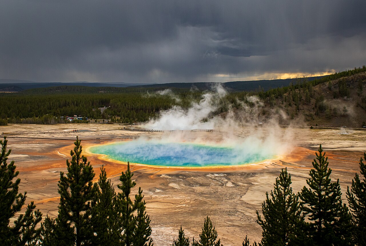 A view of the Grand Prismatic Hot Spring from the vantage point of the Grand Prismatic Overlook Trail in Yellowstone National Park, Wyoming. Grand Prismatic Spring is the largest hot spring in the Uni