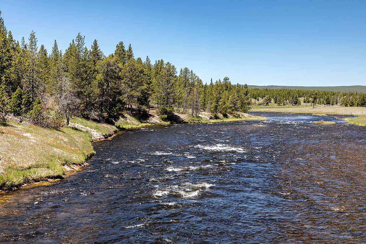 Firehole River at Midway Geyser Basin in the Yellowstone National Park, Wyoming, USAYellowstone National Park was founded on March 1, 1872, and is considered the world’s first national park. It is loc